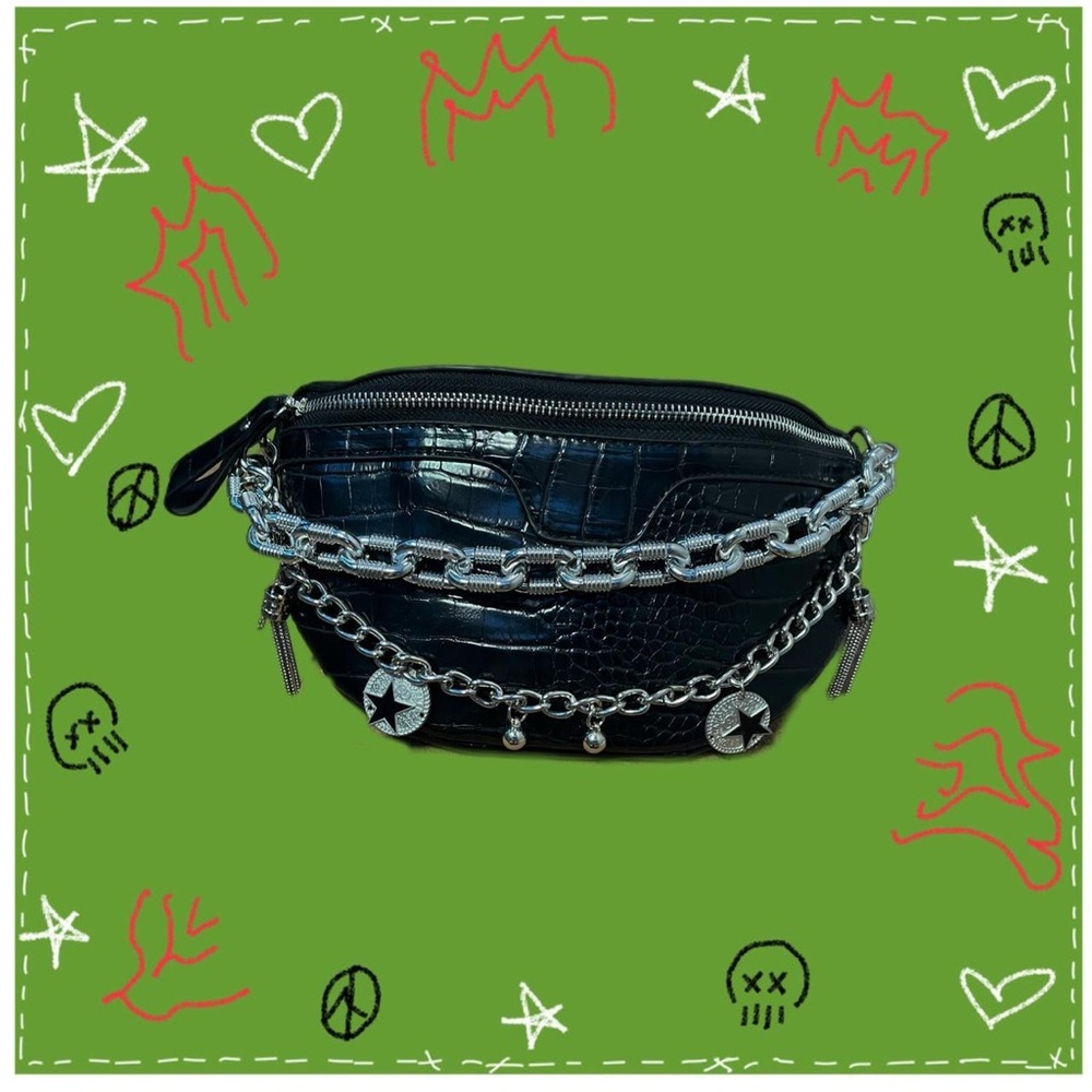 black leather purse with chain designs